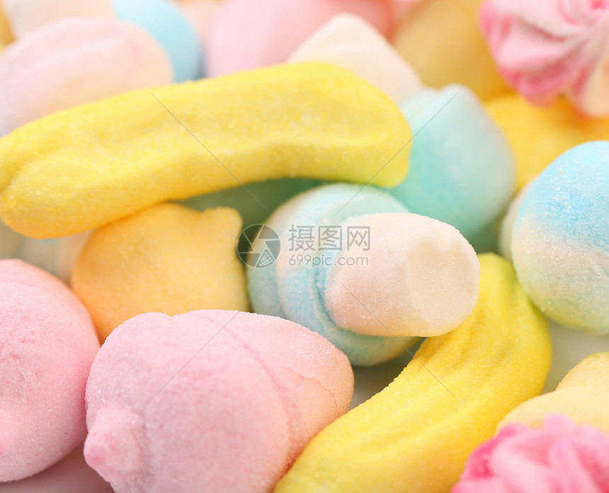 不同颜色的棉花糖黄色软糖粉色蓝色白色乐趣小吃绿色童年甜点图片