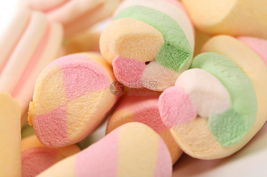 不同颜色的棉花糖垃圾棉花糖绿色蓝色糖果正方形粉色小吃食物团体图片