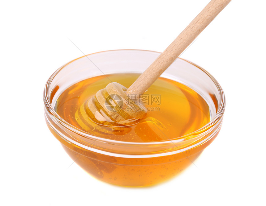玻璃碗蜂蜜和木制干洗机图片