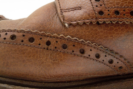 男鞋详情皮匠尺寸皮革棕色蕾丝材料肩带织物背景图片