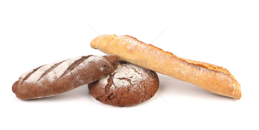 两个棕色面包和一个白面包图片