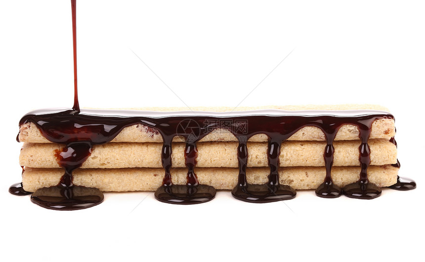饼干口味的串流巧克力食物黄色溪流巧克力糕点蛋糕金色甜点白色图片