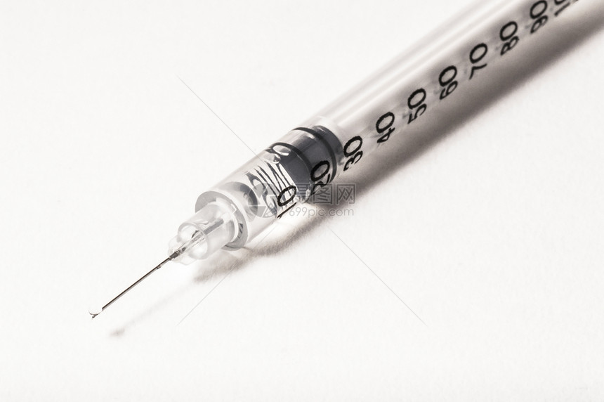 白色背景上的线状疾病乐器注射治疗药物液体宏观注射器疫苗剂量图片