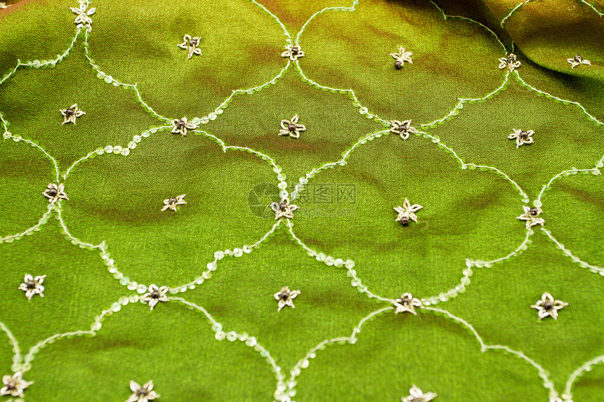 绿色西丁花料纺织天鹅绒窗帘热情折叠衣服艺术亚麻布料棕色织物图片