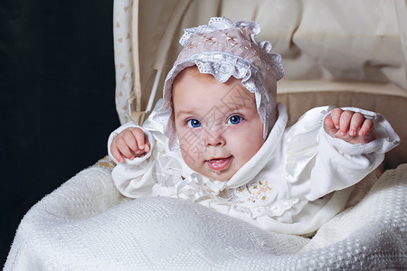婴儿在摇篮中婴儿床工作室福利稻田发祥地头巾喜悦微笑眼睛乐趣背景