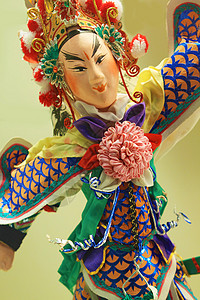 中国歌剧木偶旅游节日剧院翅膀演员男人窗帘娱乐化妆品展示背景图片