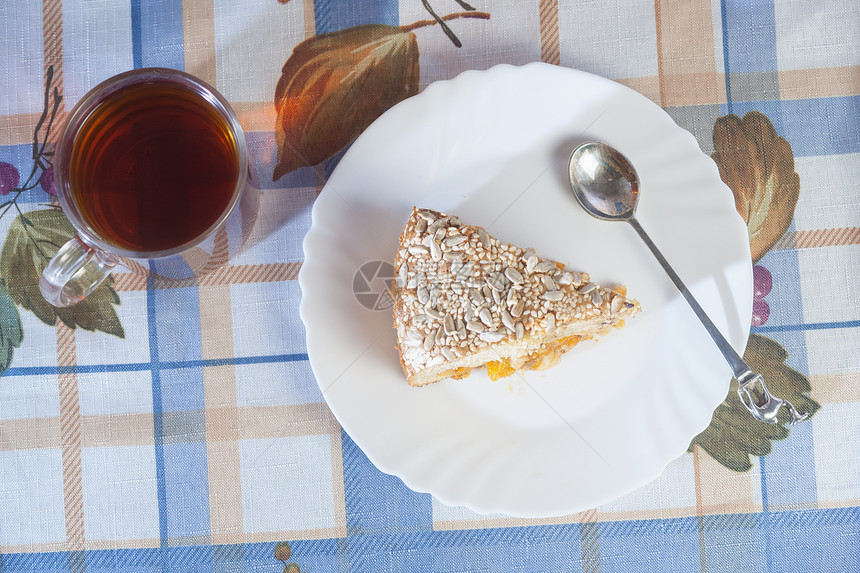 盘子里有杏子派 茶杯加茶橙子糕点蛋糕馅饼面包食物服务水果剪切美食图片