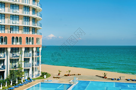 居住区假期游泳池支撑海滩海洋房子酒店旅行水池旅游高清图片