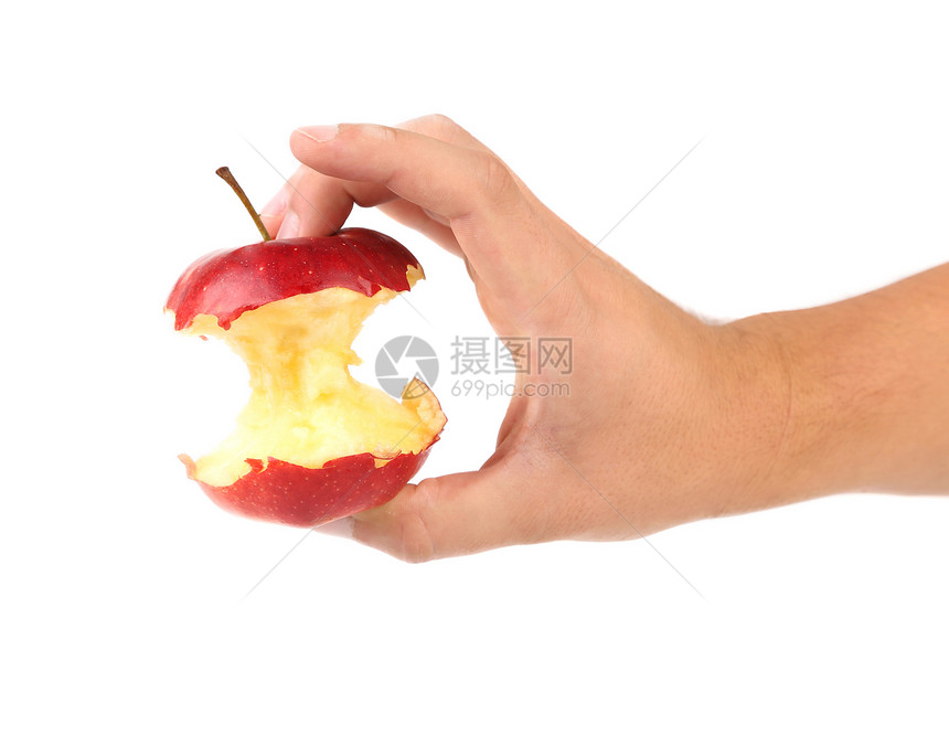 手握苹果的核心花园食物阴影宏观水果小吃果汁废料美食图片