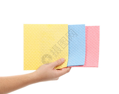 手握着不同的海绵清洁工粉色正方形抹布清洁洗澡蓝色工作地面家务背景图片