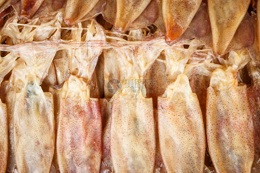 干鱿鱼海鲜热带食物触手团体乌贼棕色图片