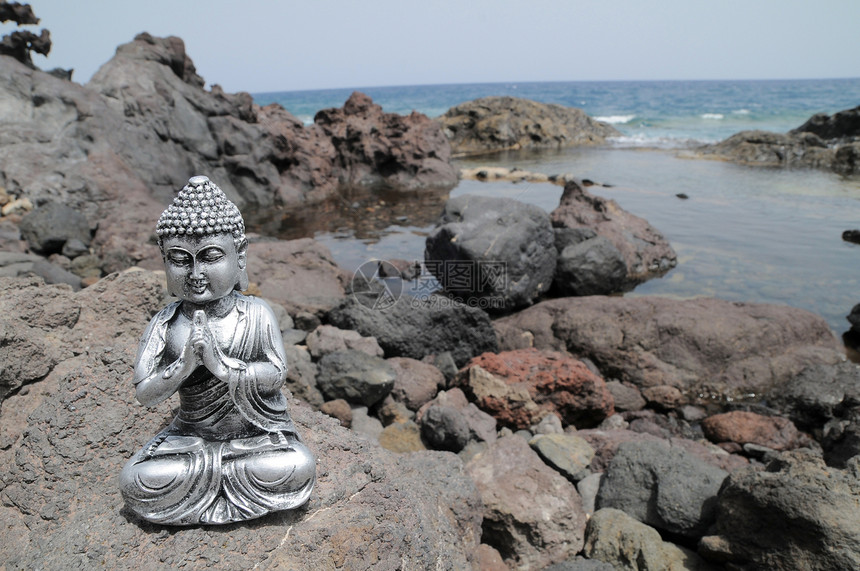 佛像雕像沉思佛教徒石头旅行上帝岩石沙漠海岸雕塑宗教图片