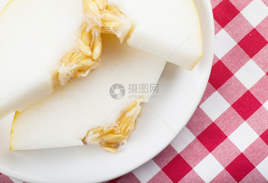 瓜片橙子盘子检查水果桌布食物美食甘露白色红色图片