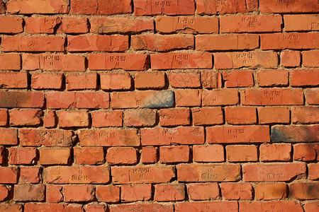 红砖墙风化安全建筑学石头长方形房子石工材料文化力量背景图片