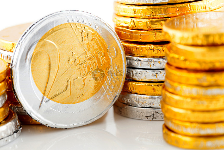 一堆巧克力欧元钱硬币糖果金融货币商业食物金子图片