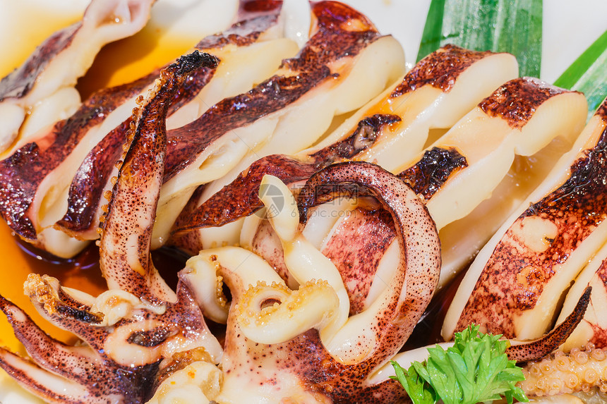含有酱油的灰状鱿鱼炙烤食物荒野海鲜海洋美食团体章鱼饮食餐厅图片
