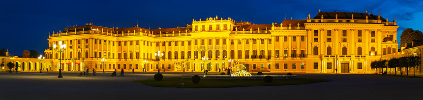 晚上在维也纳的Schonbrunn宫殿公园日落天空喷泉地标风格建筑建筑学花园旅行图片