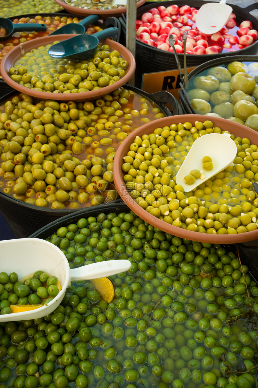 采摘橄榄市场食物摊位美食画幅绿色图片