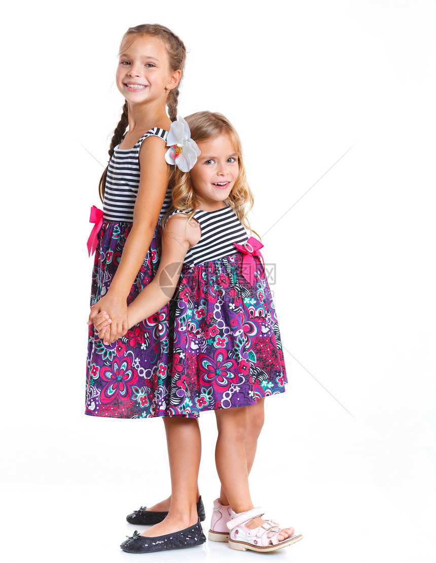 幸福的姐妹童年享受冒充活力女孩头发孩子婴儿微笑姐姐图片