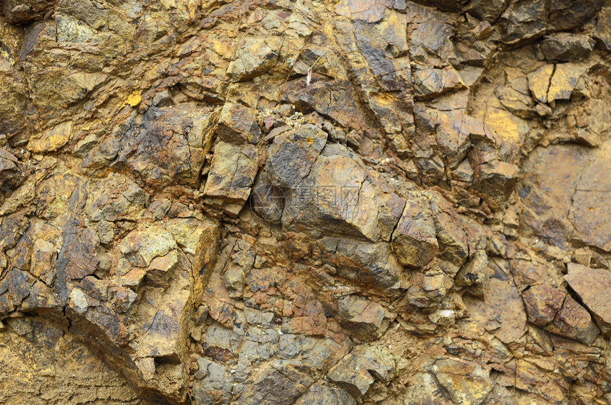 火山岩风化纹理材料灰色黑色火山矿物石头棕色花岗岩图片