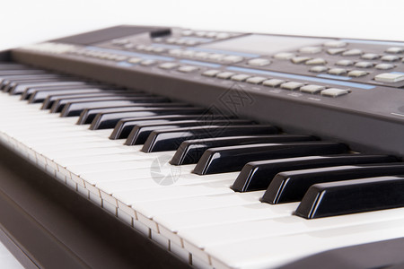 钢琴键交响乐水平韵律音乐会艺术爱好键盘钥匙白色音乐背景图片