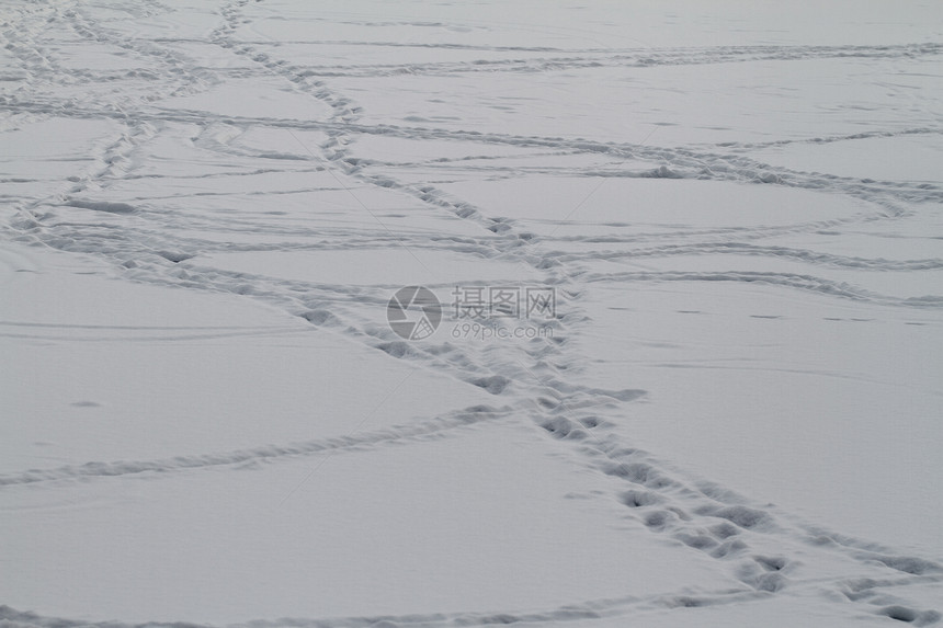 雪上脚步探索远足路线痕迹冒险脚印太阳踪迹风景高山图片