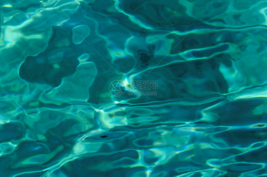 松状水面表面的绿宝石抽象背景蓝色运动插图商业墙纸黑色材料宏观框架创造力图片