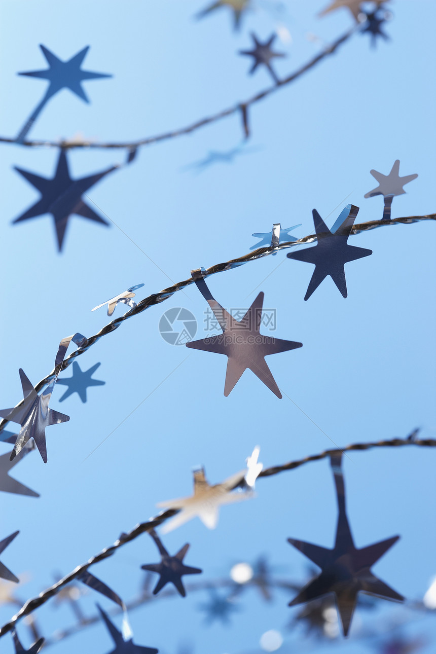 圣诞明星装饰季节性背景星形金属影棚蓝色图片