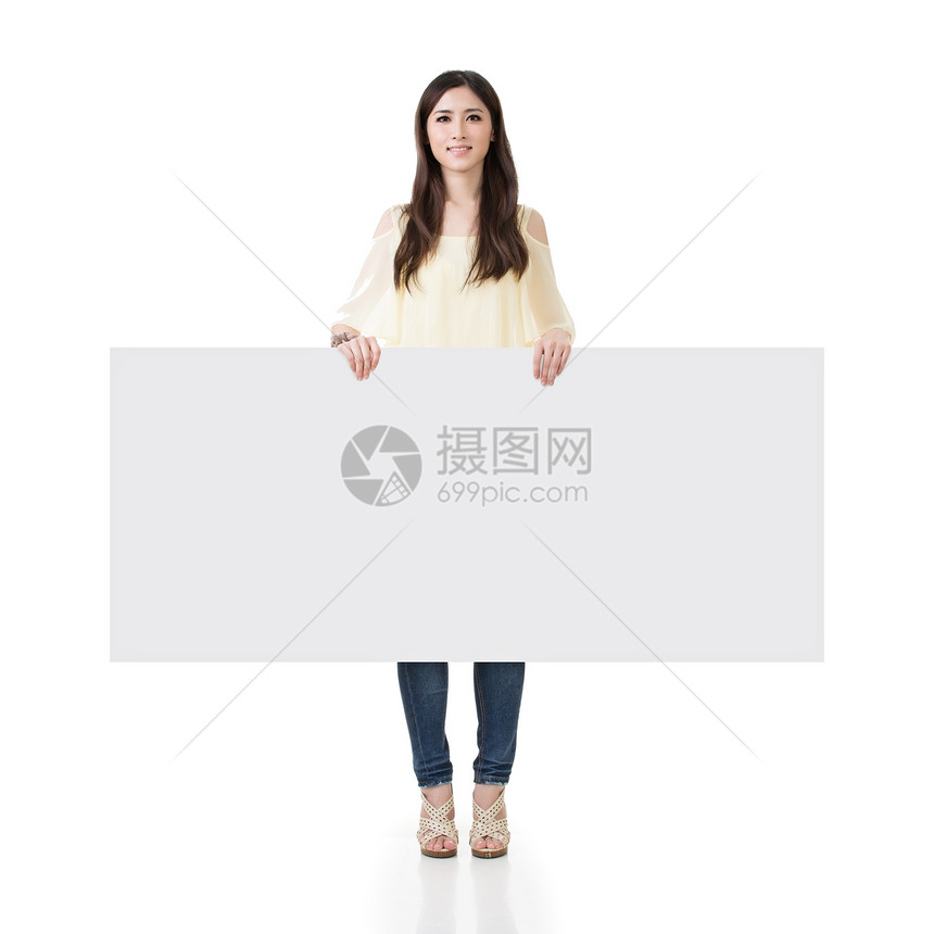 持有空白板的亚洲妇女图片