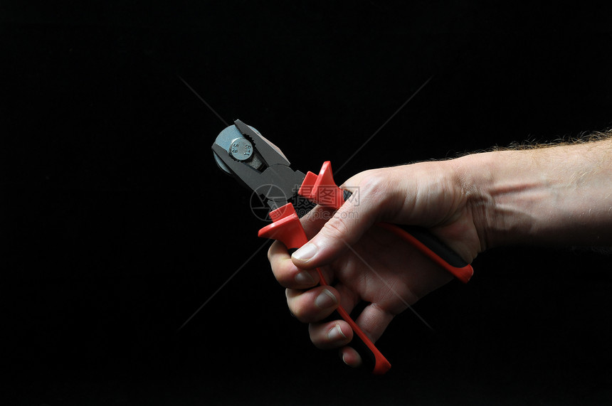 钳子和手黑色维修金属塑料工作乐器手套刀具工人扳手图片
