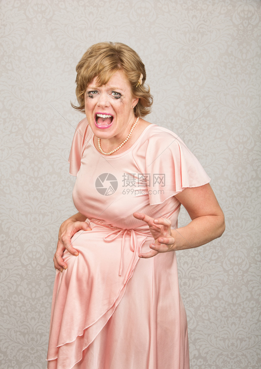 焦虑的孕妇妈妈化妆品白色震惊睫毛膏父母怀孕母性腹部母亲图片