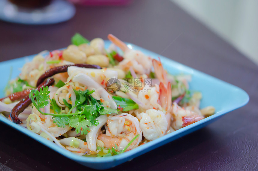 辣辣海鲜菜辣椒食物油炸盘子红色蔬菜沙拉海鲜图片