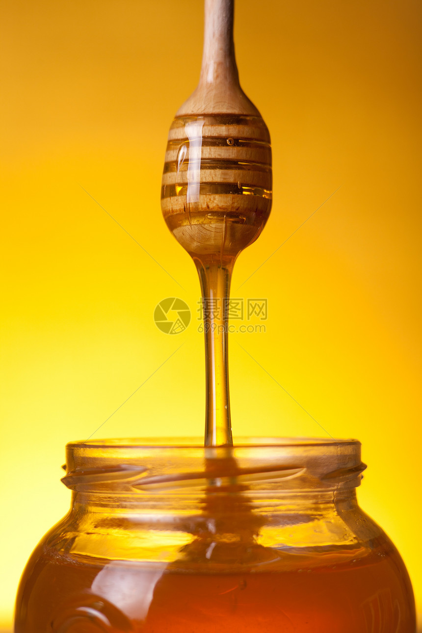 黄金蜂蜜搅拌器生态产品液体生物甜点美食玻璃药物流动图片