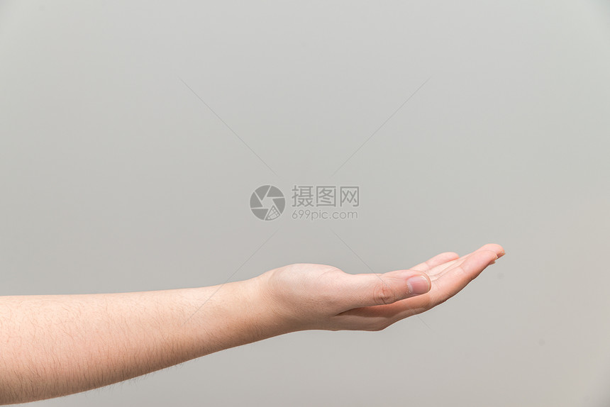 手掌与开阔的椰枣交接手腕信号广告一部分手势成功商业手指帮助身体图片
