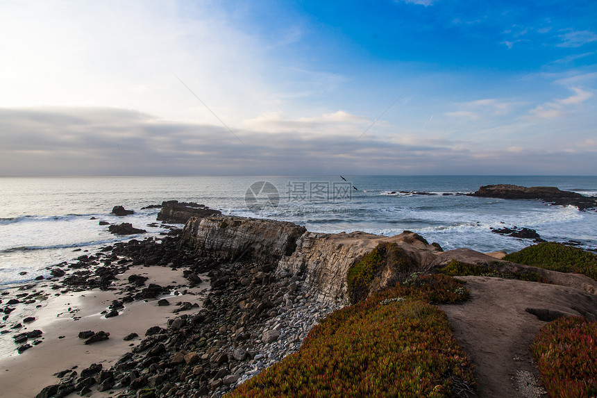 加利福尼亚海岸日落支撑波浪天空海滩风景岩石海洋图片