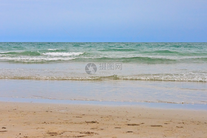 沙滩和热带海假期季节海洋海岸风景蓝色旅行地平线阳光旅游图片