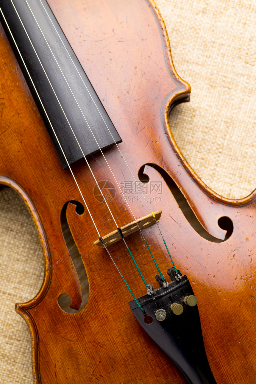 紧闭火林小提琴旋律细绳大提琴交响乐木头音乐乐器古董棕色图片