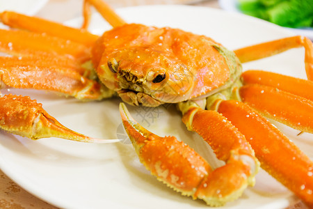 蒸汽阿拉斯加食物蔬菜盘子海鲜长腿螃蟹石蟹红色石头国王背景