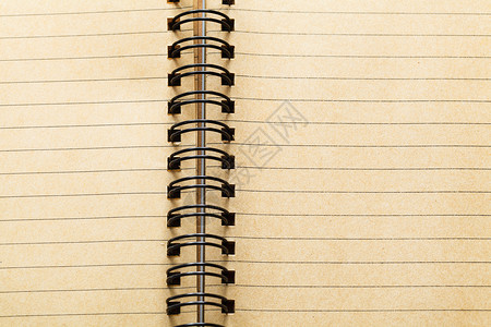 螺旋笔记本笔记记事本黑色办公用品棕色空白回收背景图片