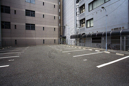 日本大阪空停车场外观场景结构城市建筑工业缺席办公楼背景图片