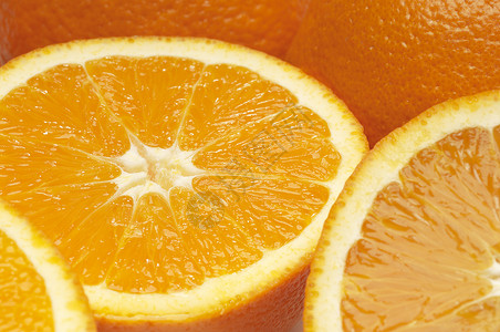 新鲜多汁橙色板块的详细图像背景图片