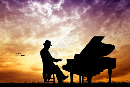 钢琴家乐趣日落钢琴音乐会音乐唱歌男人庆典背景图片