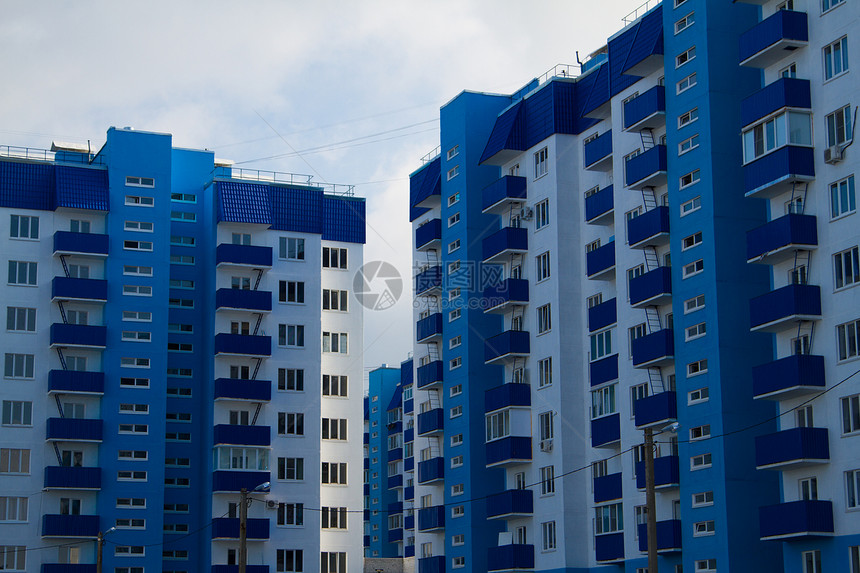 公寓区旅行建筑蓝色城市住房玻璃天空投资房子窗户图片