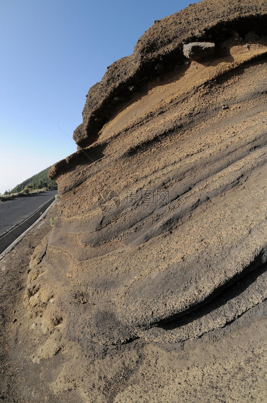 古代火山岩海洋太阳火山地标地区蓝色石头火鸡风景历史图片