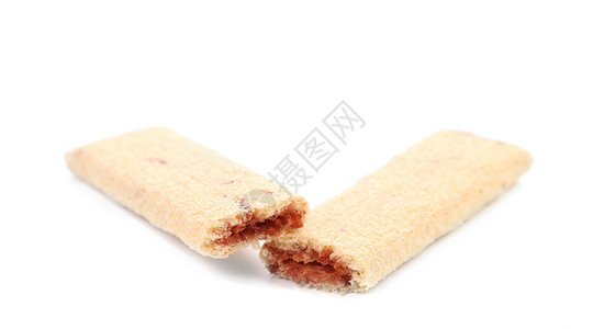 粉碎的饼干棒加填充糕点金色蛋糕甜点食物白色红色黄色背景图片