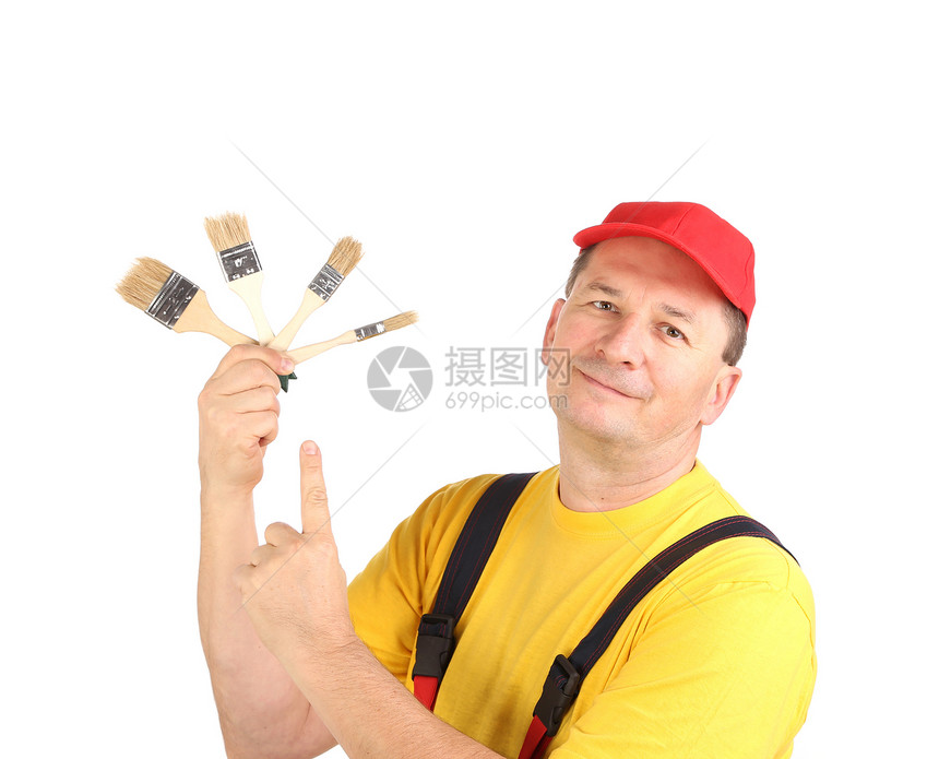 工人展示画笔维修乐器手指红色帽子安全帽蓝色白色连衣裤刷子图片
