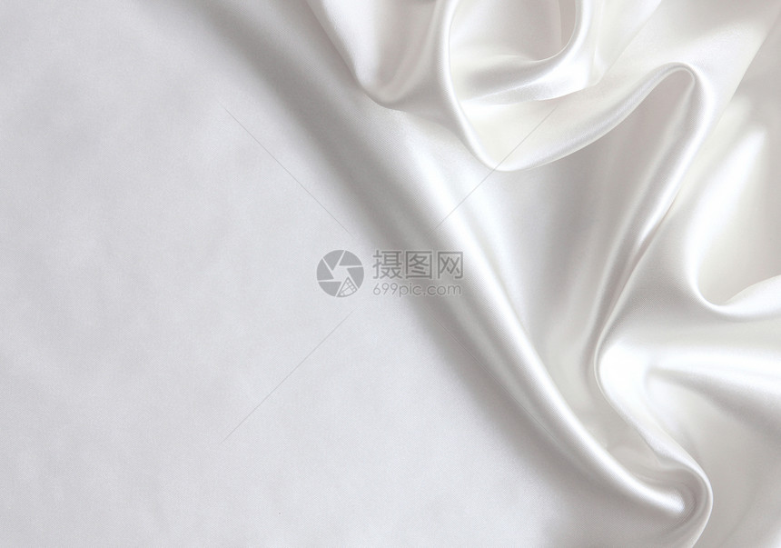 平滑优雅的白色丝绸作为背景材料布料曲线新娘织物纺织品海浪折痕银色婚礼图片