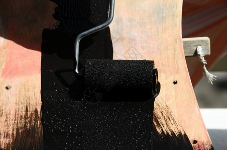 恢复旧式滑板绘画甲板滚筒古董装修刷子木头装潢工具滑冰背景图片
