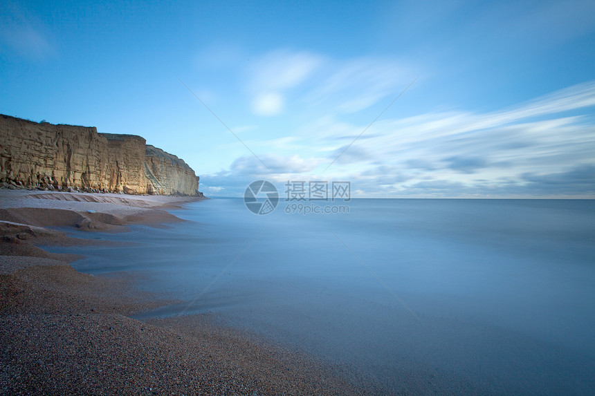 西湾Dorset海岸英格兰波浪日落遗产海景晴天图片