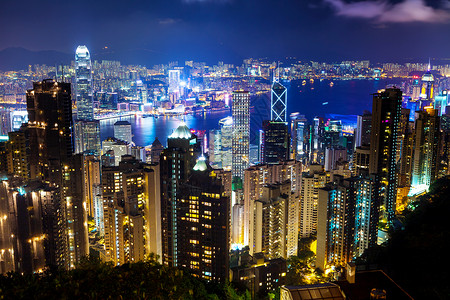 企业之魂晚上在香港天际金融地标摩天大楼办公楼公司天空城市商业区大楼背景